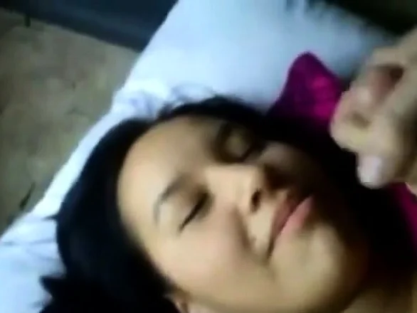 Chubby sweet Asian babe getting a massive facial in closeup