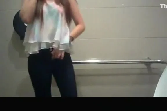 Asian girl spied in public toilet peeing