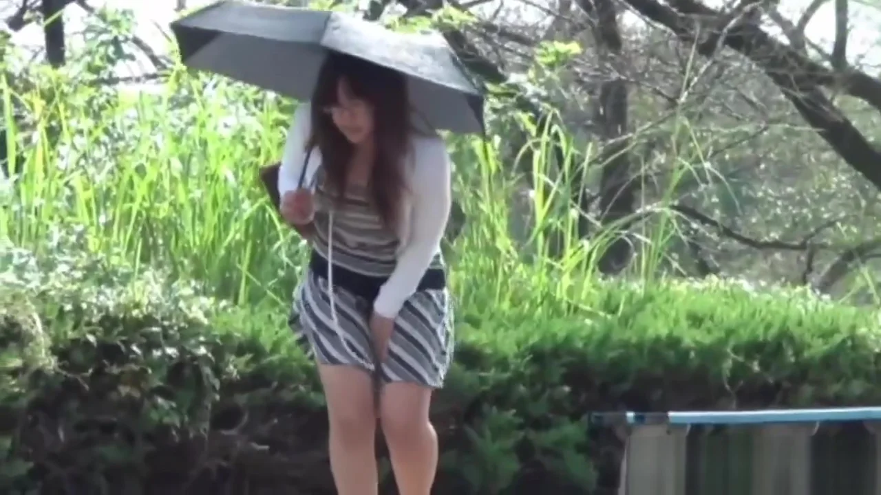 Asian pees in public park