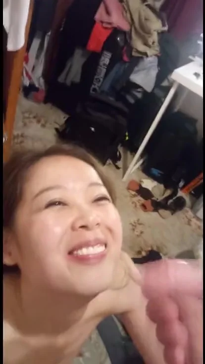 Cute asian wife sucks big cock and gets cum on her face
