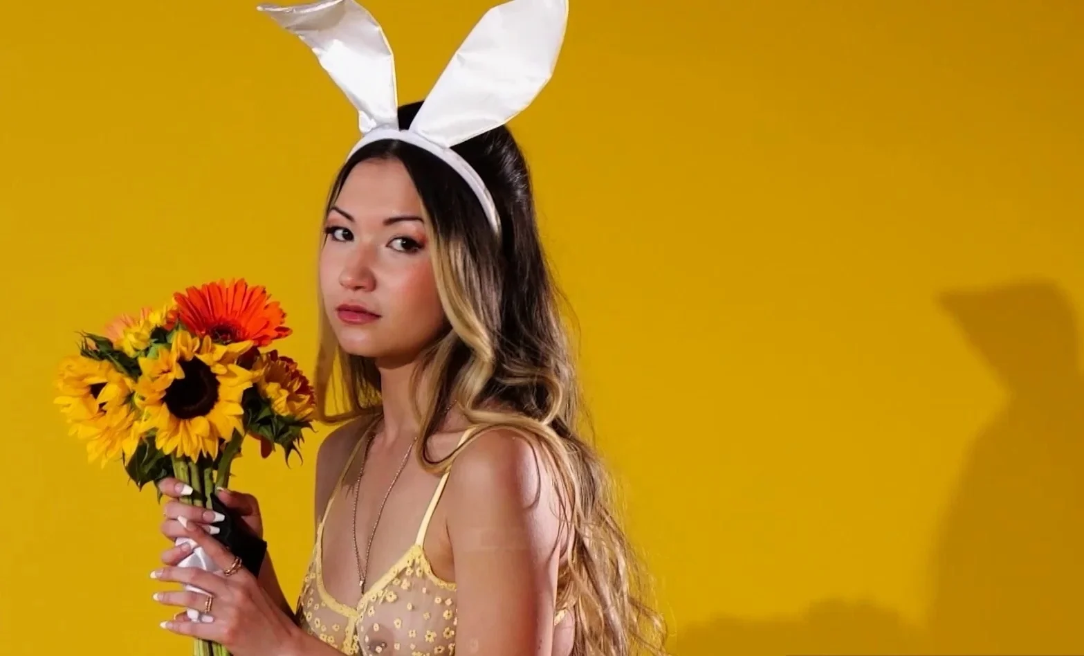Exotic asian bunny reveals her big boobs
