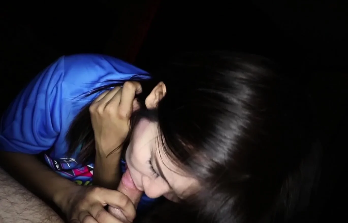 Amateur Thai teen massaging a white cock