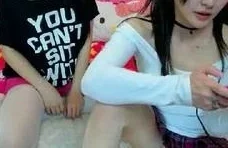 Japanese teens enjoys lesbian action