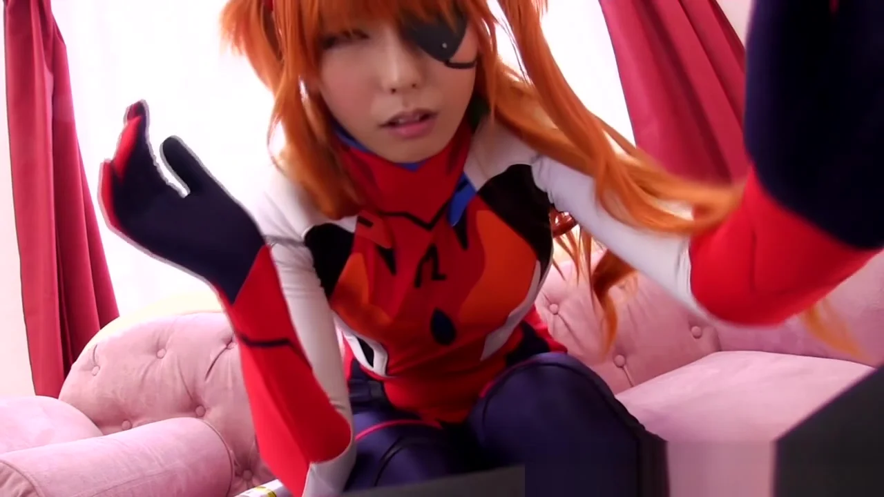 Japanese cosplay ginger babe tugging cock