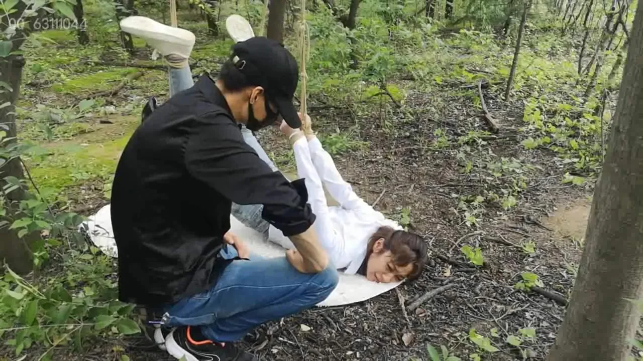Cute Asian Tied In Forest